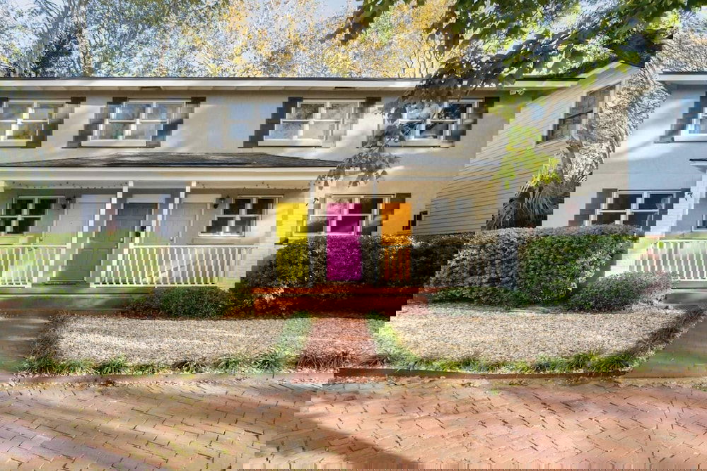 Vibrant, Colorful Condo Building With Backyard Firepit And Games - thumb 1