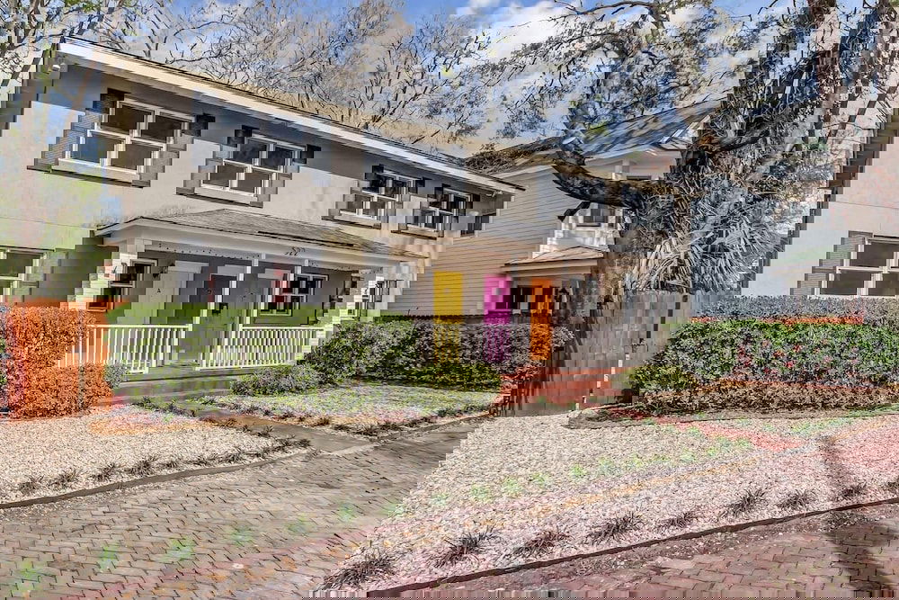 Vibrant, Colorful Condo Building With Backyard Firepit And Games - thumb 3